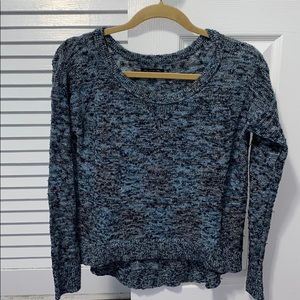 Light sweater with gold sparkle accent